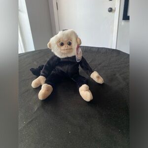 Adorable Black and Cream Stuffed Monkey Toy
